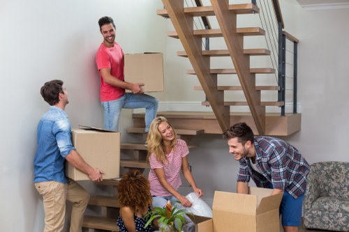House removalists planning a move in Sydenham with packing boxes and furniture