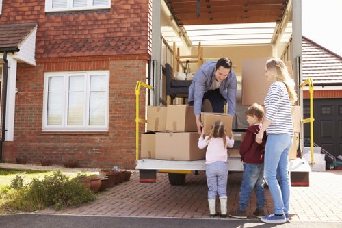 Man and van removal loading furniture in Sydenham