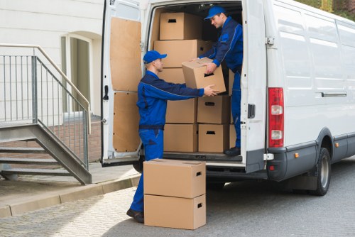 Local moving van handling furniture collection in Sydenham