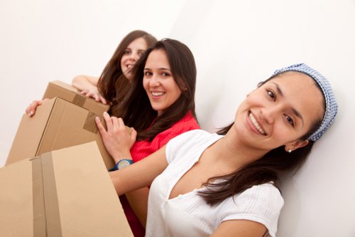 Packed boxes and furniture ready for collection on moving day