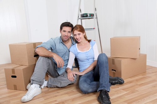 Loading furniture into a van near local Sydenham homes
