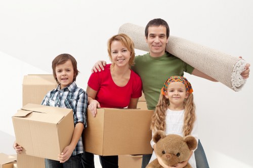 Commercial moving team relocating office equipment near Sydenham