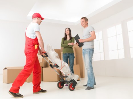Team handling furniture carefully during a local relocation