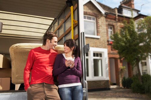 Professional movers loading items for a home move in Sydenham